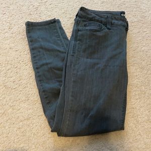 Dark green skinny jeans